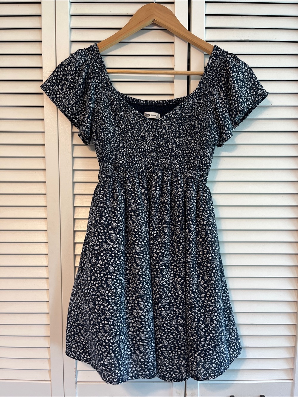 Hollister Navy Blue Floral Smocked Short Sleeve mini dress.